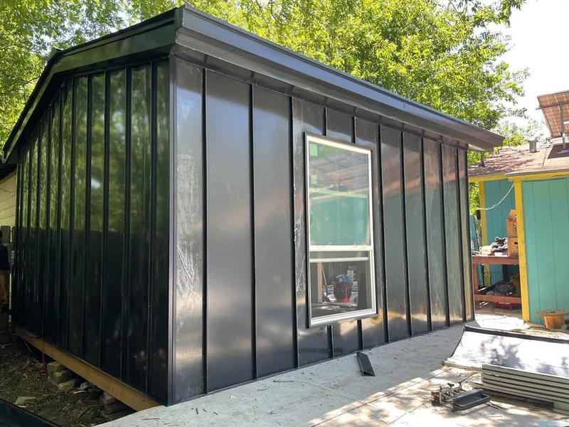 Black standing seam metal wall panels for Roof Inspection in Oceanport